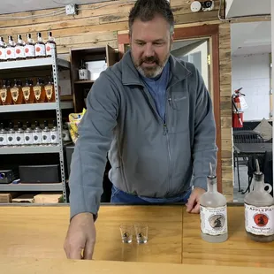 One of the owners, Chris, letting us sample the Rum, Apple Pie Moonshine, and Amaretto (in order of bottles pictured).