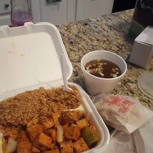 General tofu with Wonton soup and fried noodles. Lunch portion.