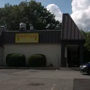 a car parked in front of a building