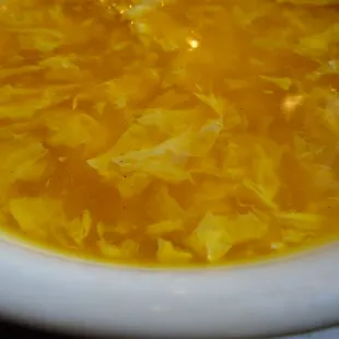 Egg drop soup, close-up.