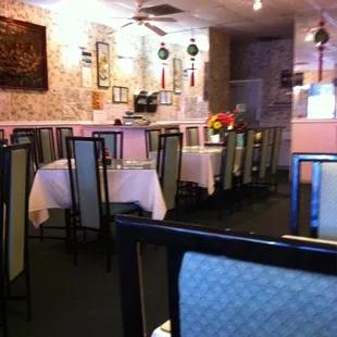 dining area with tables and chairs