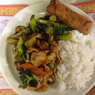 Dinner combo: chicken and broccoli with white rice and eggroll.