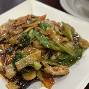 a plate of stir fried vegetables