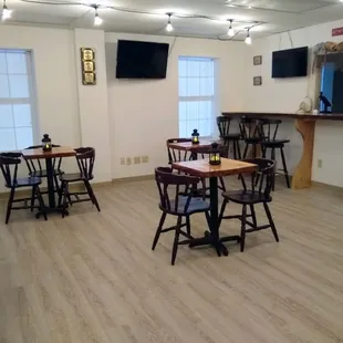 tables and chairs in a large room