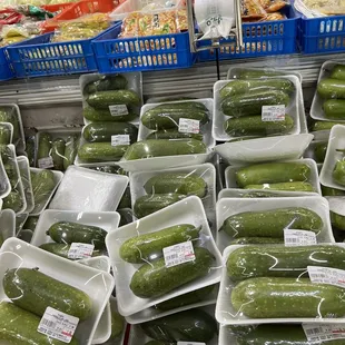 cucumbers in plastic containers