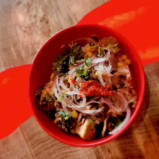a red bowl of food
