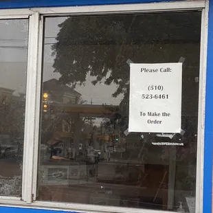 a sign in the window of a restaurant