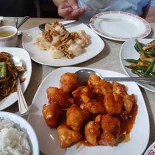 Orange chicken, green bean chicken, walnut shrimp &amp; vegetable lo mein with white rice