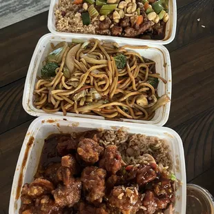 Top to bottom: Kung Pao chicken combo, veggie lo mein, and general tso&apos;s combo