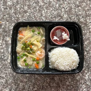 Lunch portion to-go is a small. Similar to a kids portion. Compare sauce container to portion to rice &amp; entree.