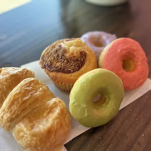 Ham and cheese croissant, raspberry muffin and donuts