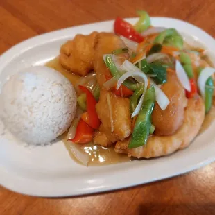 a plate of food with rice and vegetables