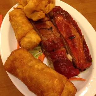 Comes with family style-BBQ rib, crab puff, egg roll