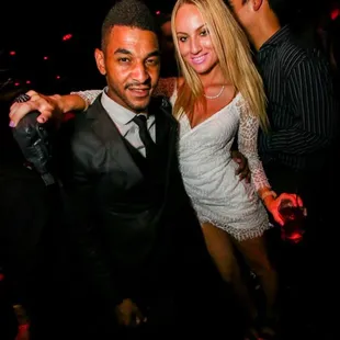 a man and a woman posing for a picture