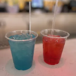 two drinks in plastic cups