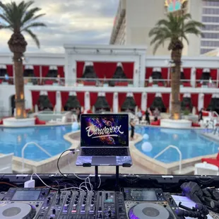 a laptop and dj equipment