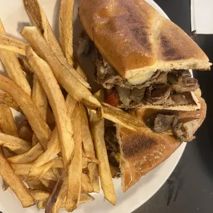 Philly steak and cheese and fries with honey mustard