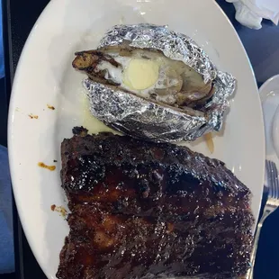 Half rack and baked potato +grilled onions