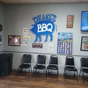 chairs lined up against a wall