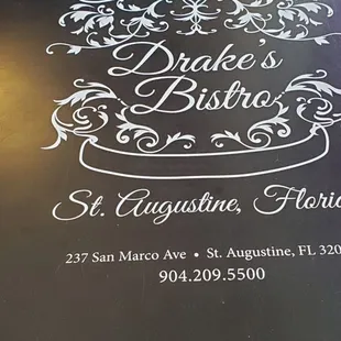 Cover of their menu with address.