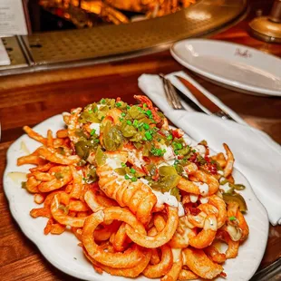 a plate of pasta and a glass of wine
