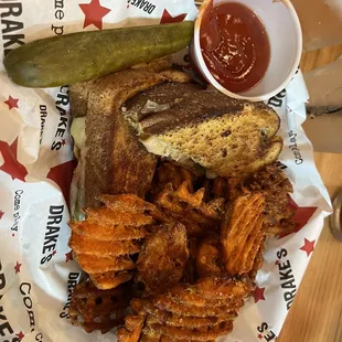 Turkey Swiss avocado sandwich and sweet potato waffle fries