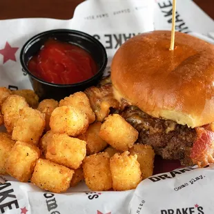 a burger and tater tots
