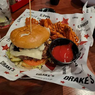 Mushroom Swiss burger with sweet potato waffle fries