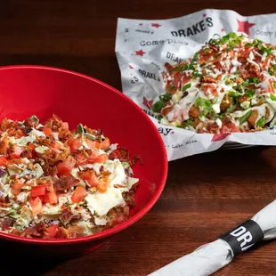 a bowl of coleslaw and a napkin