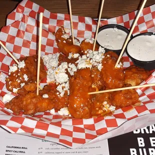 a basket of buffalo wings