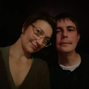 a man and a woman posing for a picture