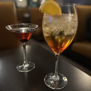 two cocktails on a table