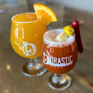 two glasses of beer on a table