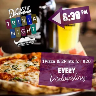 a pizza and a glass of beer