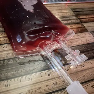Blood Bag: cognac and multiple fruit forward liquors. Sweet but strong.