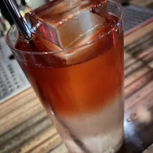 Along the lines of a Zombie, layers of rum, banana and berry liquors with a touch of absinthe. Super tasty, but you have to mix it!