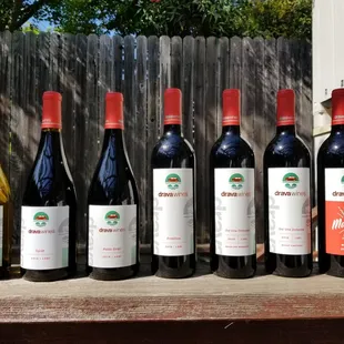 a row of bottles of wine