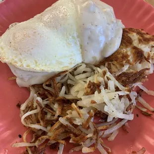 Biscuit and gravy with the perfectly cooked runny egg. Loved the hashbrowns.