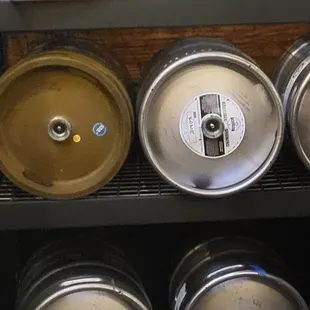 a row of beer kegs