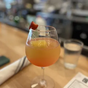 a drink in a wine glass