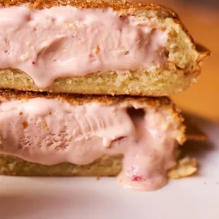 SAVORY BUN BRUSHED WITH SUGAR AND WARMED IN A FUN BUN PRESS, THE INSIDE OF THE WARM BUN IS FILLED WITH A SCOOP OF ICE CREAM OF YOUR CHOICE.