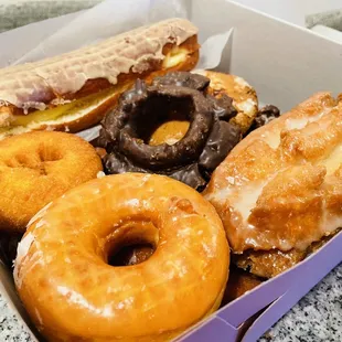 a variety of donuts in a box