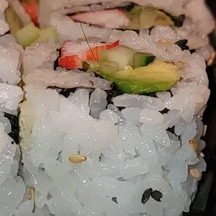 a plate of sushi rolls