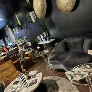 a living room with black walls