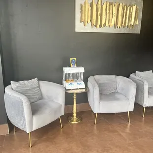 two chairs and a side table