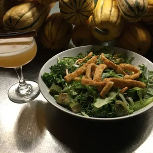 Rum, pineapple, and scorched cinnamon stick  with the Farmer&apos;s Salad