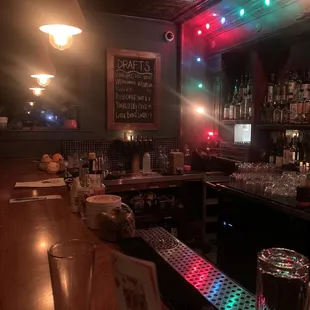 a bar with a lot of lights