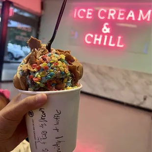 Vanilla puffle with cookies and dream ice cream and taro ice cream on the bottom