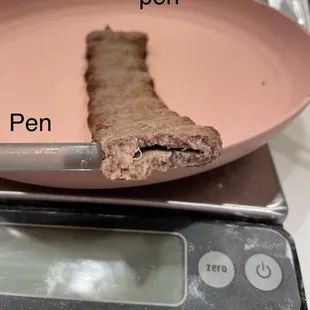 Super thin koobideh the same "thin-ness as a pen. Dry and not juicy.