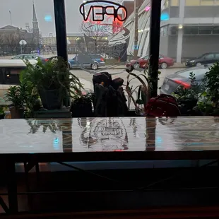 a view of a street through a window